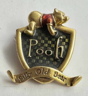 Pooh Sitting on shield broach pin