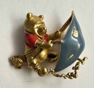 Pooh on a blustery day pin