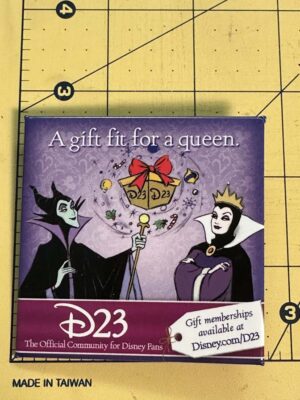 2009 Disney D23 holiday promotional button featuring Maleficent and the Evil Queen