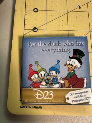 2009 Disney D23 holiday gift membership promo button featuring Scrooge McDuck and his nephews