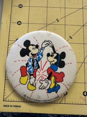 Mickey and Minnie Mouse dancing likely from the 1980s button