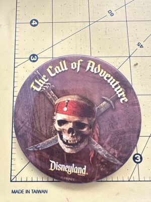 Disney Pirates of the Caribbean "The Call of Adventure" button