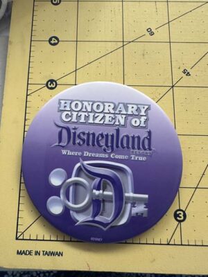 Disneyland Resort "Honorary Citizen" purple button