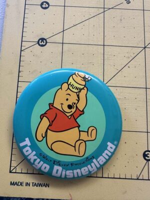 1980s Tokyo Disneyland button featuring Winnie the Pooh
