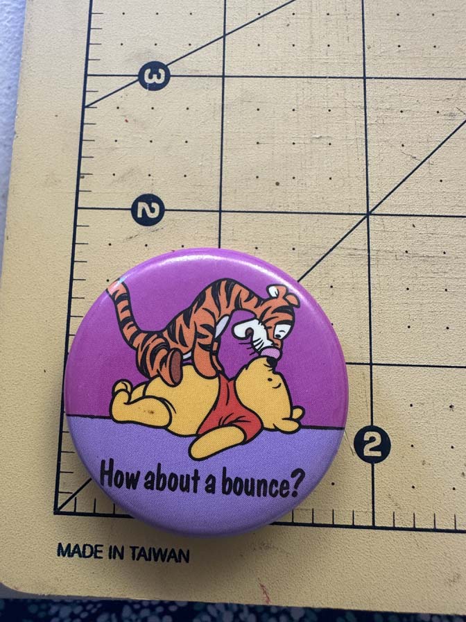 Tigger Sitting on Pooh button