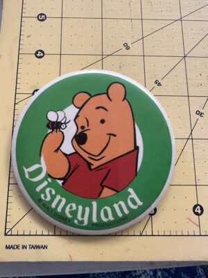 Winnie the Pooh and a bee button