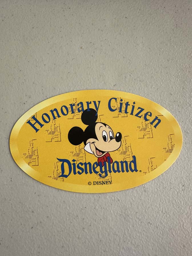 vintage Disneyland "Honorary Citizen" oval sticker features Mickey Mouse