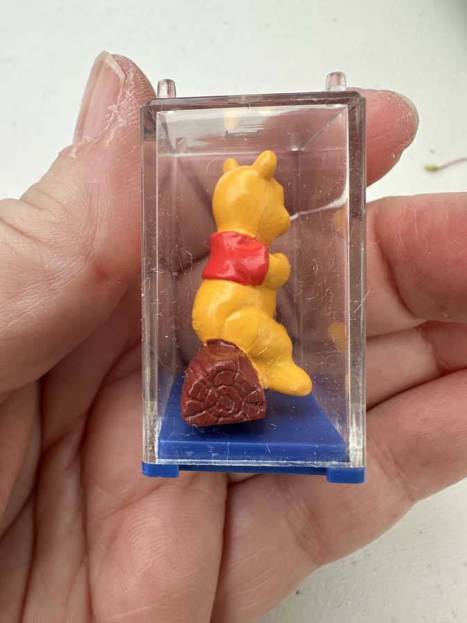 Winnie the Pooh collectible figure is encased in a clear plastic display box with a blue base - Image 4
