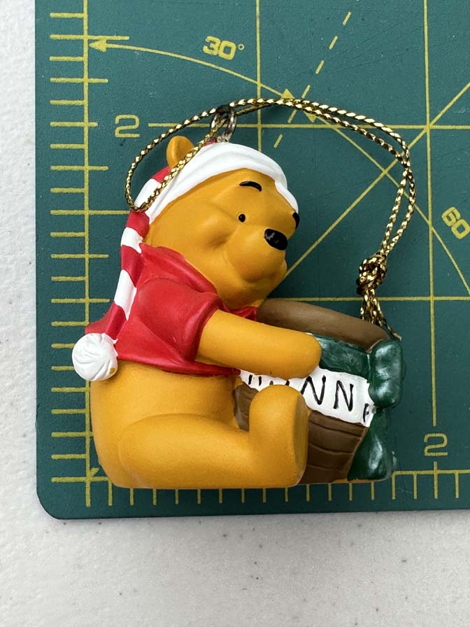 Hallmark Disney Santa Hat Winnie the Pooh with Honey Pot Christmas ornament