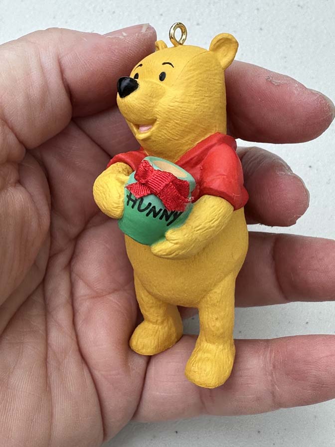 1991 Hallmark Keepsake ornament featuring Winnie the Pooh holding a green "Hunny" pot - Image 2