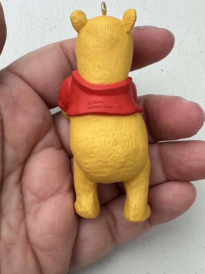 1991 Hallmark Keepsake ornament featuring Winnie the Pooh holding a green "Hunny" pot - Image 3