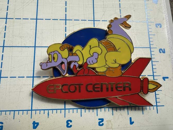Disney jumbo pin features Figment riding a red Epcot Center rocket - Image 3