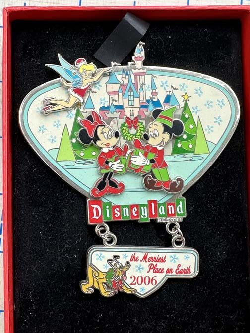 Disneyland Resort 2006 "Merriest Place on Earth" Christmas jumbo pin featuring Mickey Mouse, Minnie Mouse, and Tinker Bell