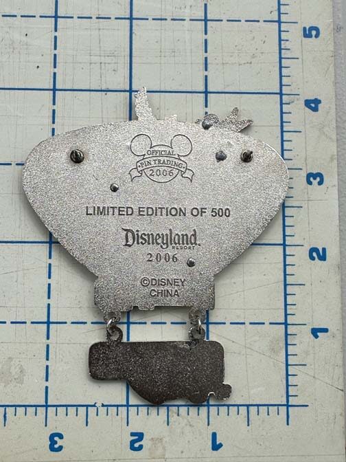 Disneyland Resort 2006 "Merriest Place on Earth" Christmas jumbo pin featuring Mickey Mouse, Minnie Mouse, and Tinker Bell - Image 2