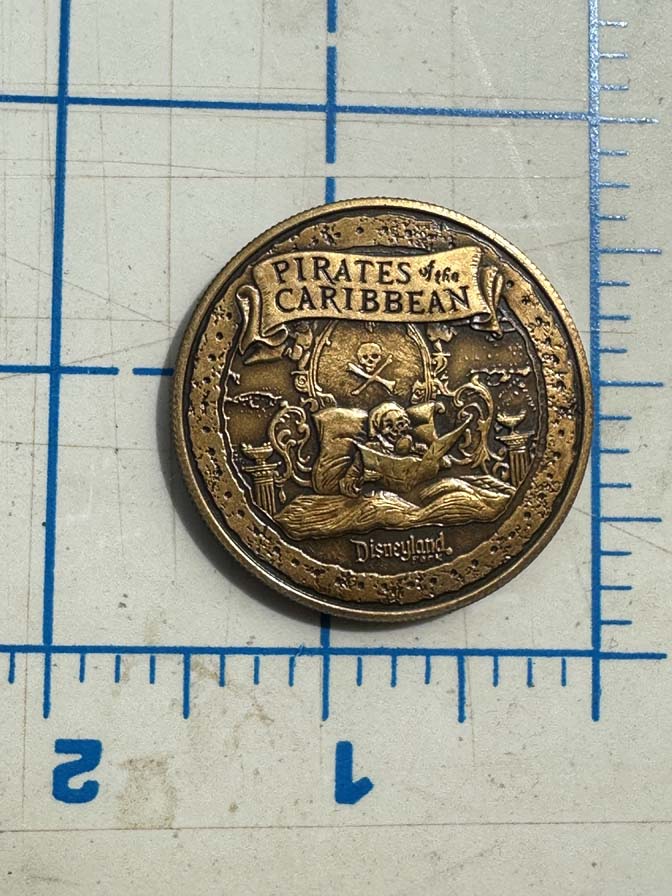 Disneyland 2006 Pirates of the Caribbean Coin in plastic sleeve