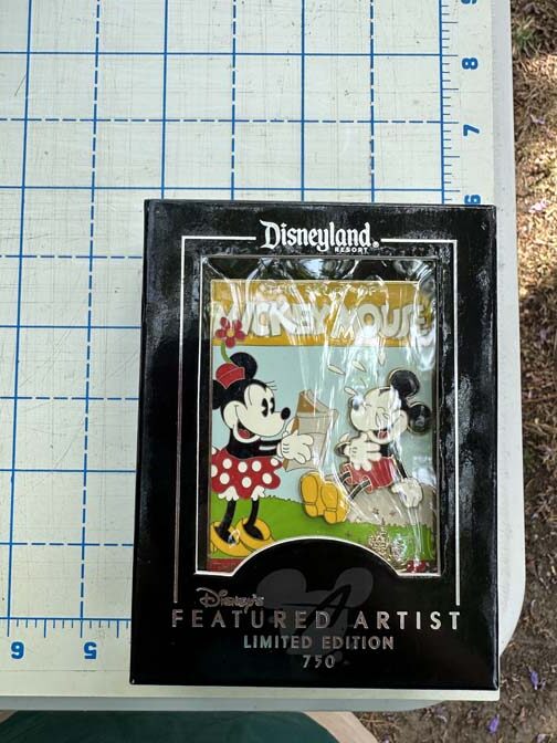 Jumbo pin "The Story of Mickey Mouse Through the Years," featuring Mickey and Minnie Mouse in a classic animation style - Image 5