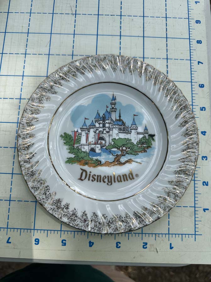 Vintage Disneyland souvenir plate featuring Sleeping Beauty Castle