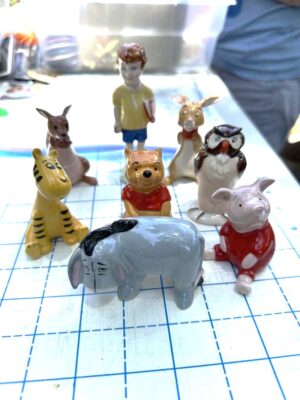 Beswick Porcelain Winnie the Pooh figurines 8 pc set from England.