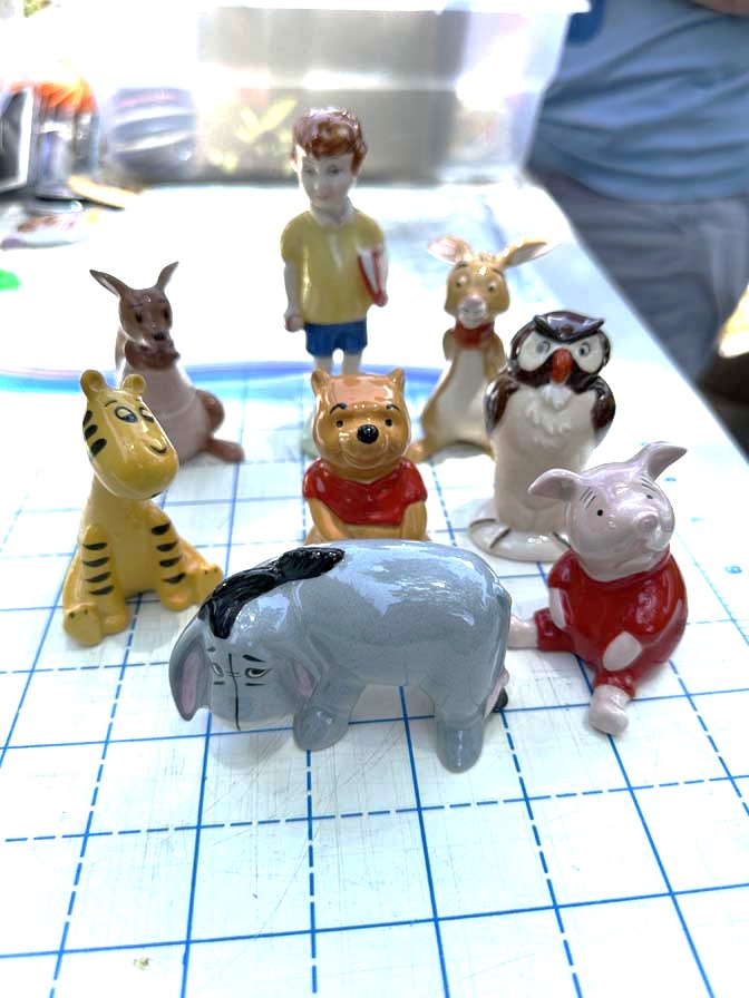 Beswick Porcelain Winnie the Pooh figurines 8 pc set from England.