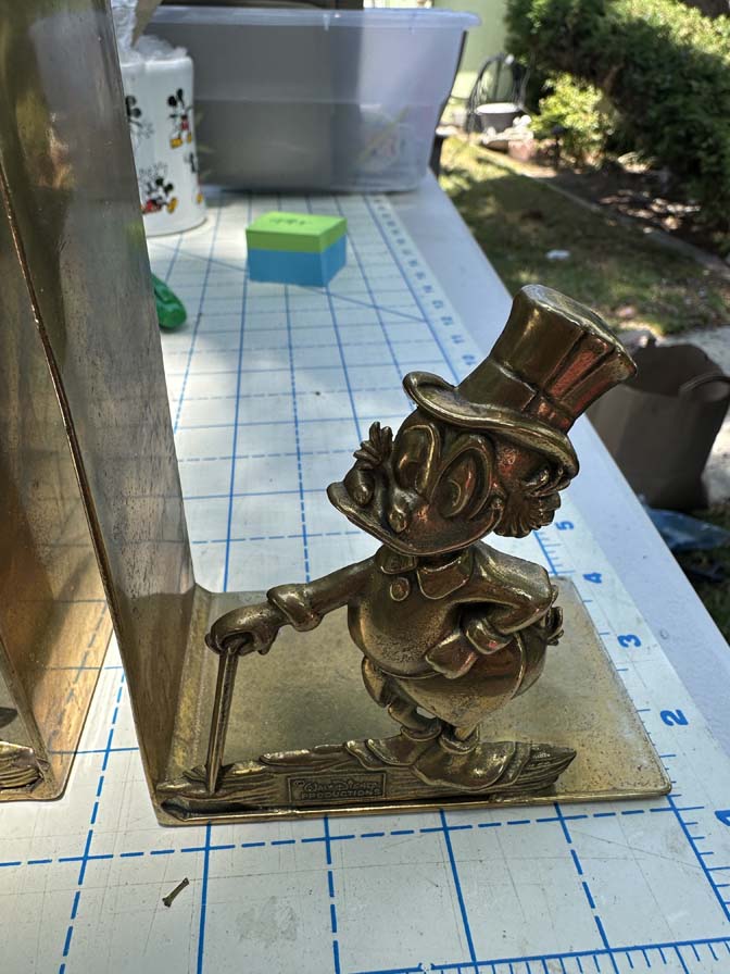vintage Walt Disney Productions Scrooge McDuck bookends are crafted from solid brass - Image 9