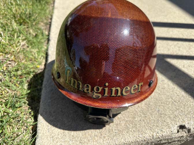 Walt Disney Imagineering (WDI) hard hat, JOE name specifically featuring a red carbon-fiber style finish and Sorcerer Mickey Mouse. - Image 3