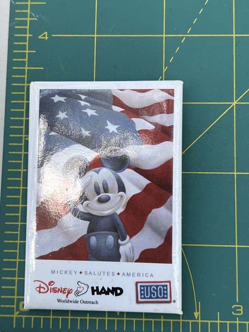 limited edition Disney Hand button featuring Mickey Mouse saluting the American flag