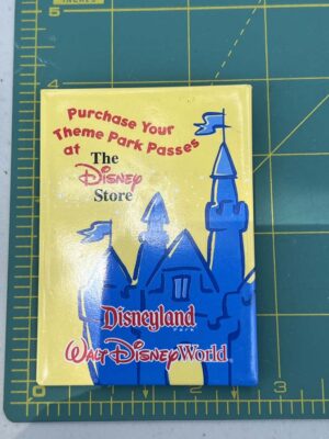 Disney Store cast member promotional button used to advertise the sale of theme park passes
