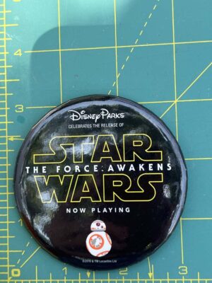 Disney Parks button celebrating the release of Star Wars: The Force Awakens