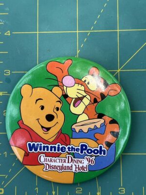 1996 Disney button featuring Winnie the Pooh and Tigger from a Disneyland Hotel character dining event