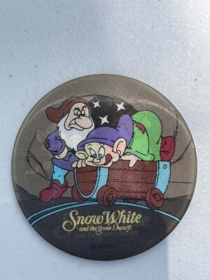 3-inch Disney lenticular button features Dopey and Grumpy from Snow White and the Seven Dwarfs